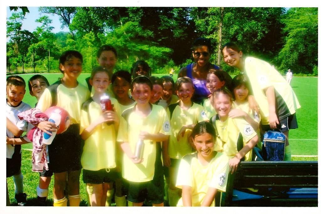 Bella Boshara, top right, with Michelle Obama after the soccer game she played against Malia Obama.