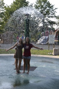 2 exchange students from Spain enjoy the fountain at Kirkwood Park