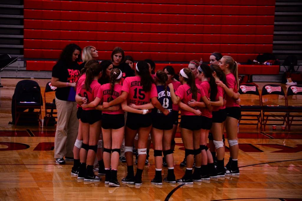 Volleyball team digs for pink