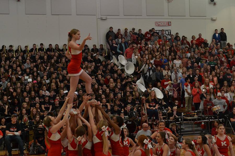 Junior Macy Robbins during varsity cheer performance at the Turkey Day pep rally.