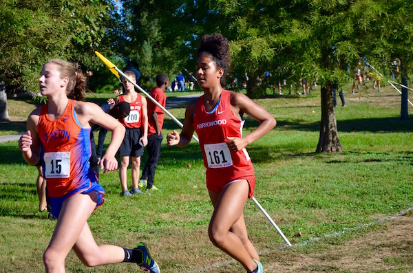 Tabby Stowers, junior, is the first runner from Kirkwood at the end of the first loop in the varsity race and finished in 24th place.