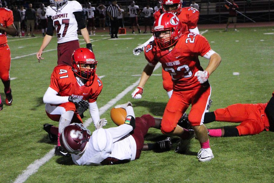 Stephen Manley, junior, celebrates after making a tackle.