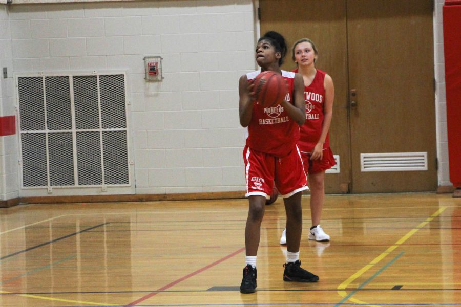 Daneen Burks, freshman, prepares to shoot the basketball.