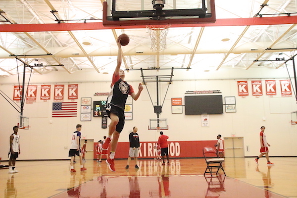 Jonah McDowell, junior, performs layup.