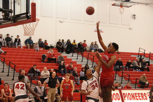 Leondre Clay, senior, shoots the ball in the paint.