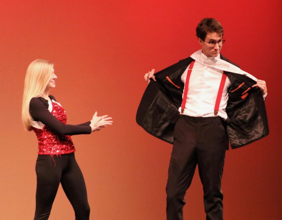 Sam Bliss and Tatum Shore-Fitzgerald, juniors, pose during the formal wear part of the competition.