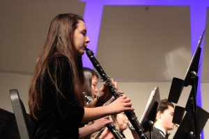 Phebe Hammond, sophomore, plays her clarinet at the band concert.