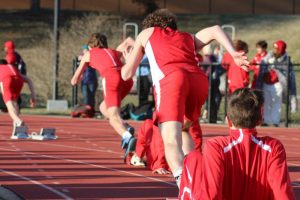At the fire of a gun, athletes on the KHS boys track team begin one of the meets many races.