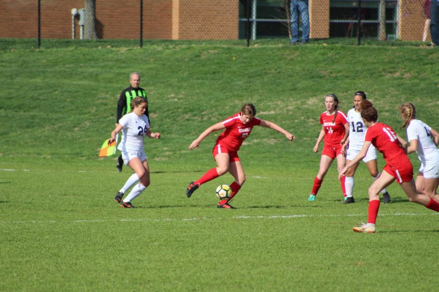 Evie Borbonus, sophomore,  makes sure the opposing team doesnt get the ball. 