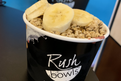 The Lemon Squeeze Acai smoothie bowl, topped with granola, honey, and bananas.