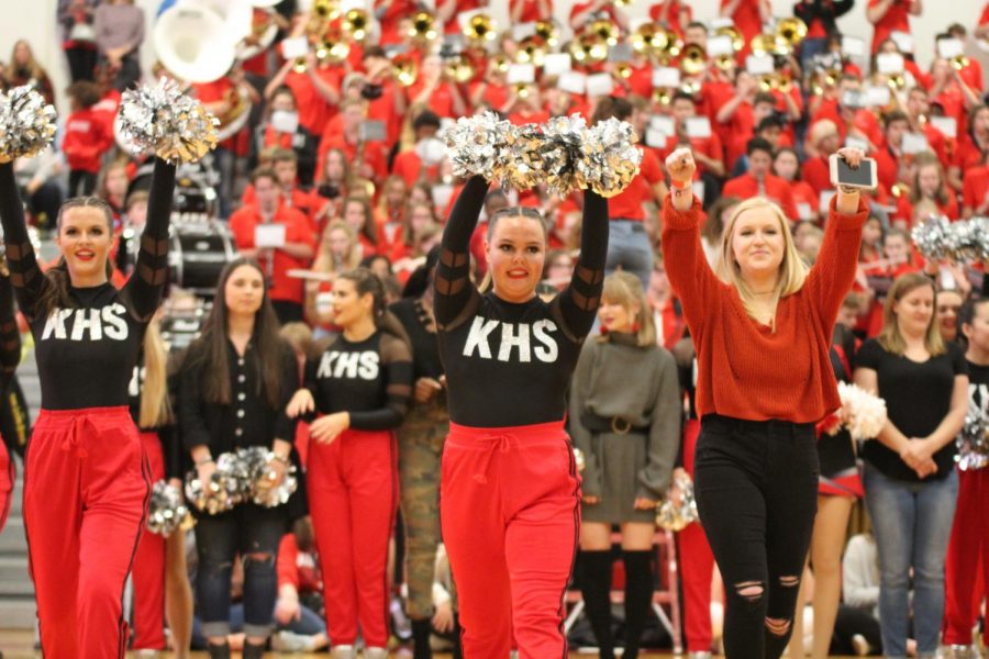 Abbey Siegel, senior, leads the pommies during their dance at the pep rally. 