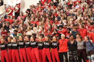 The junior sections sings along to Hail Kirkwood High School.