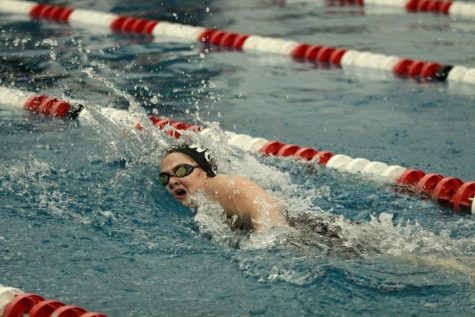 Elizabeth Green, sophomore, turns for a breath during her 200 freestyle. 