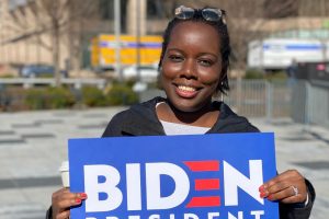Tiffany Hamilton holds her Biden sign at his rally in downtown STL.