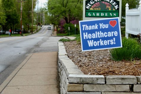 Many local businesses and homes are displaying signs to show their support for workers on the front lines of the pandemic. 