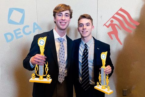 Seniors Zach Millenbruck and Aidan McGee took home first place in the integrated marketing category of the 2020 regional DECA competition. Photo Courtesy of Zach Millenbruck and Aidan McGee. Art by Emma Frizzell. 