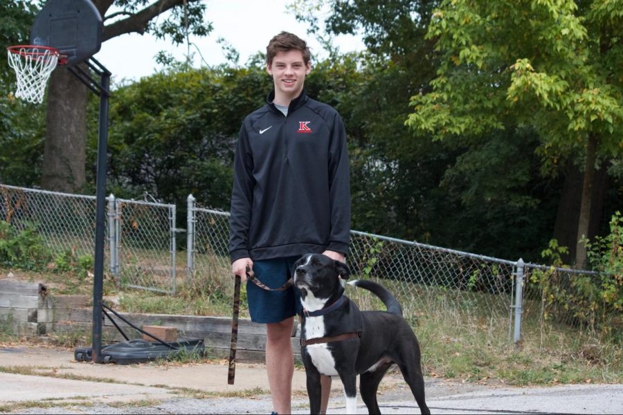 Rj Morgan, junior, and his dog Hank.