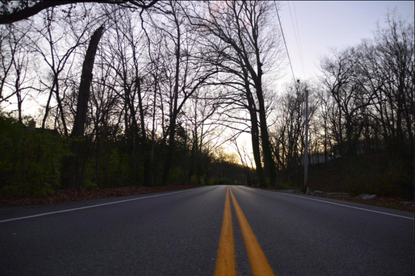 This photo of a road at sunset is inspired by the song Canyon Moon. 