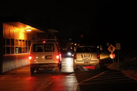 Police and maintenance surround the crime scene on Wednesday, Jan. 6.