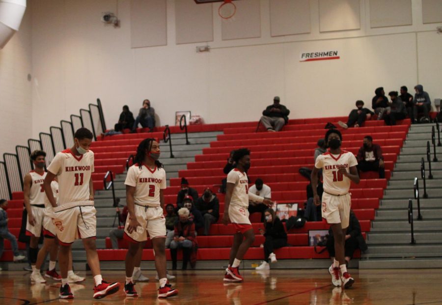 Kirkwood players walk onto the floor at the start of the second half. 