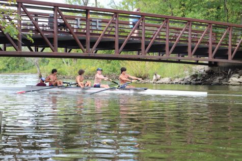 Members of St. Louis Rowing Club (SLRC) go under a bridge during practice on Sunday, Sept. 22.