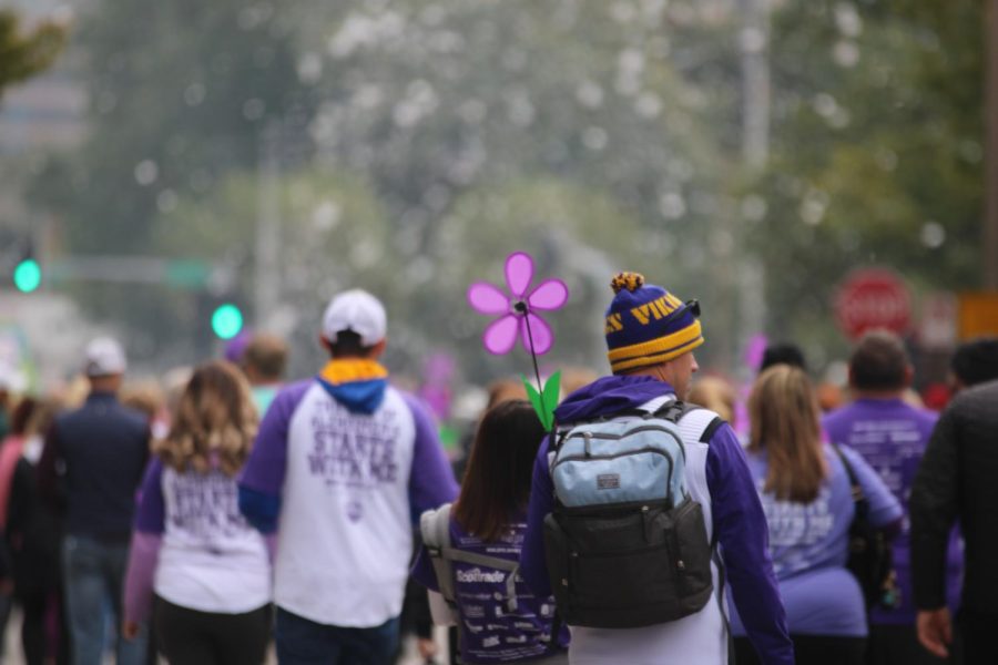 Each registered participant in the walk receives a Promise Garden flower, each color representing their connection to the disease. A purple flower is for those who have lost someone to Alzheimers.
