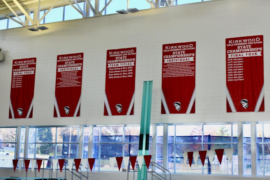 The banners with past titles hang on the wall of the Natitorium.