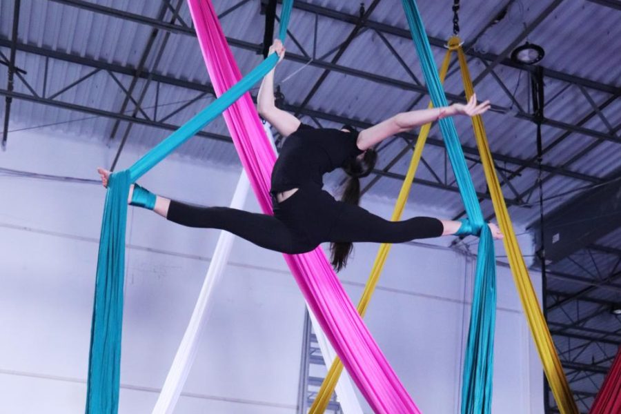 Natalie Bednarksi practices her aerial silks skills on March 5.