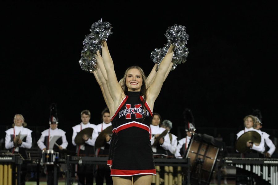 Addie Campbell, senior, smiles after finishing the halftime show.