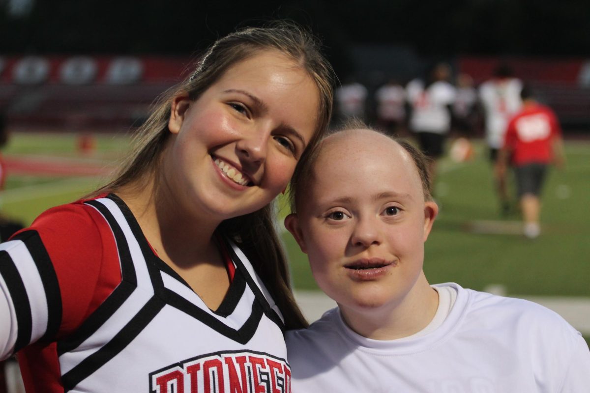 Emma Frate, junior, and Audrey Bernabo, senior, pose for a picture together.