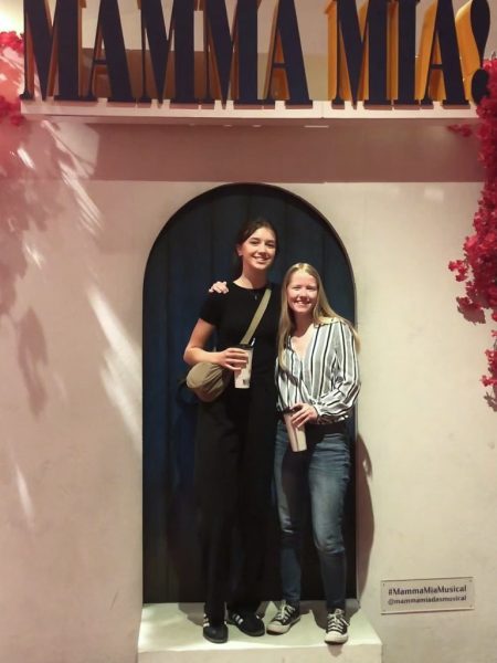 Fox and her German exchange partner, Lichtfeld, pose together in front of the Mama Mia sign. 

Photo courtesy of Gwenyth Fox

